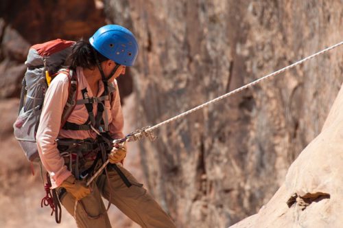 climbing down the mountain